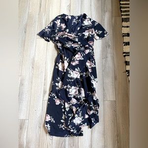 Wrap dress, navy blue with flowers, size 1x and has a tie to wrap the dress